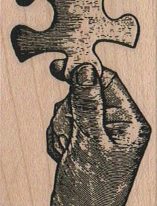 Hand Holding Jigsaw Puzzle Piece 1 1/2 x 3 1/2-0